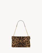 YSL CASSANDRE large pouch on chain in pony hair leather